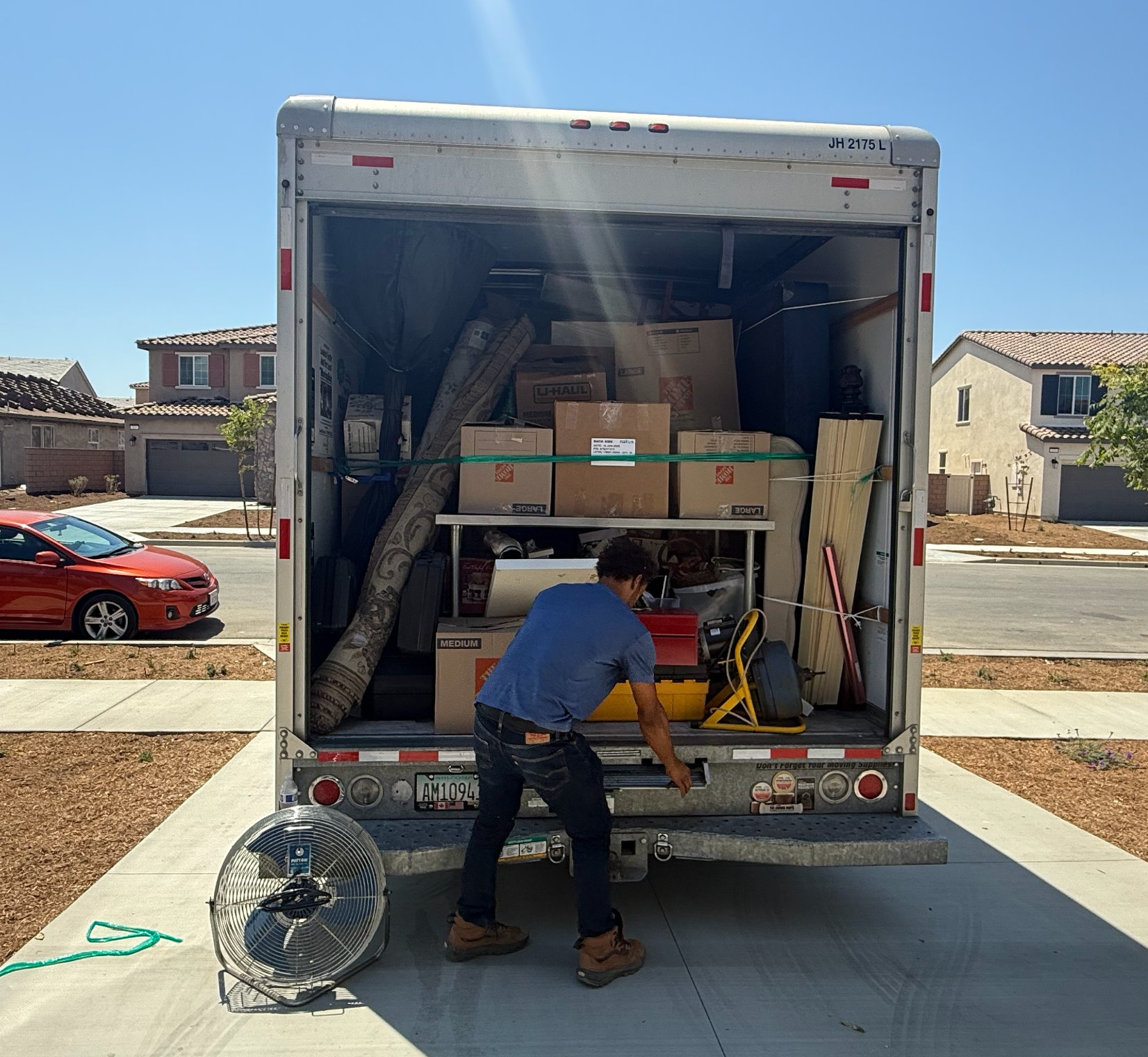 Sutton Movers crew loading a moving truck