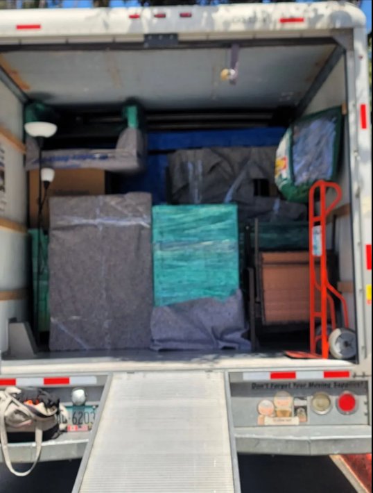 Wrapped furniture in truck